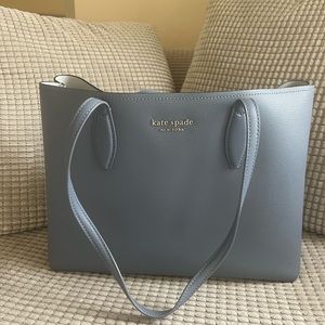Kate Spade tote in blue.  Hardly been used.